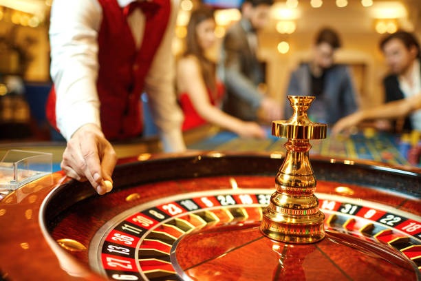 kuat bet mobile app showing Mega Moolah stake selector and spin button